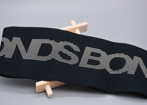 โลโก้ซิลิโคนแถบยางยืดผ้าฝ้าย 100% สองด้านสำหรับเสื้อผ้า