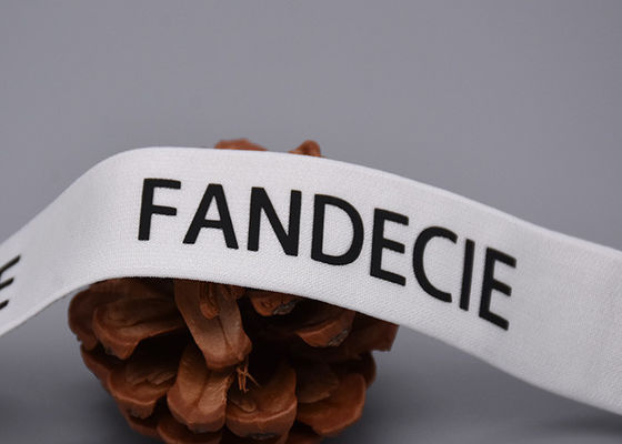 เสื้อผ้าแถบยางยืดแบบกำหนดเองที่พิมพ์ด้วยโลโก้สีดำด้าน